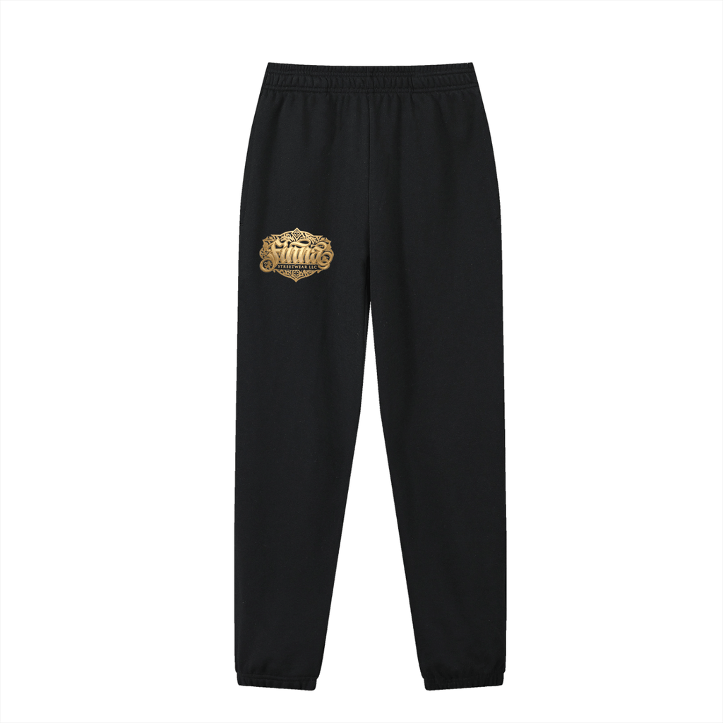 GoldFiore Essential Jogged Sweatpants featuring a logo on black fabric, perfect for comfort and style.
