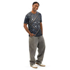 Art Deco cotton t-shirt worn by a man, featuring a stylish filigree design against a blue background.