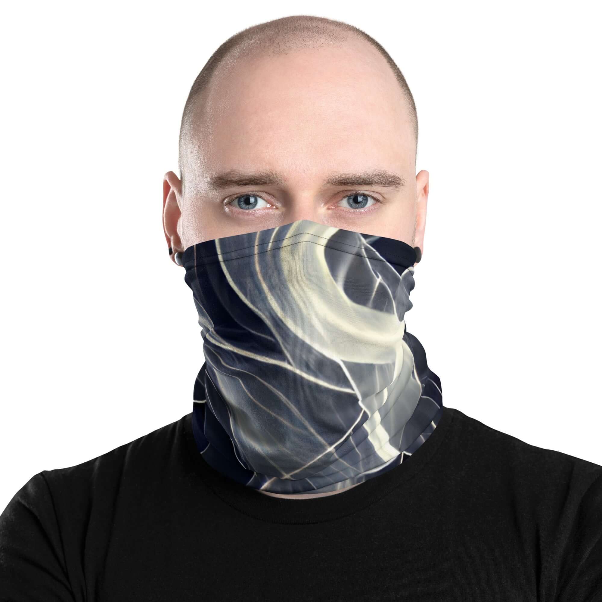 Man wearing a Smoke pattern gaiter as a face covering, showcasing its stylish design and comfort for everyday use.