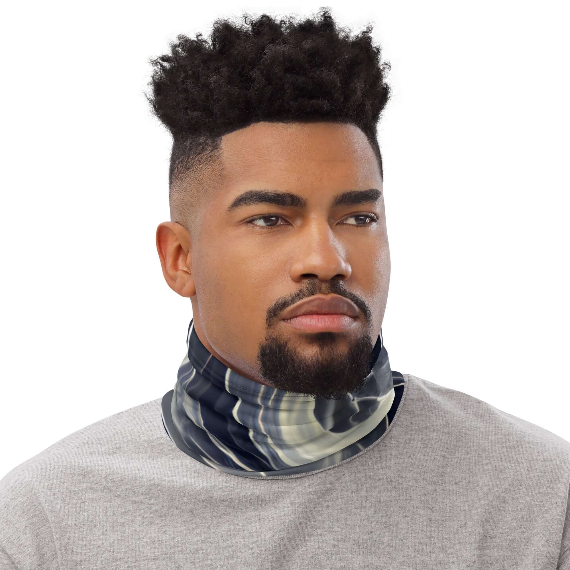 Man wearing a Smoke pattern gaiter as a neck warmer for comfort and style.