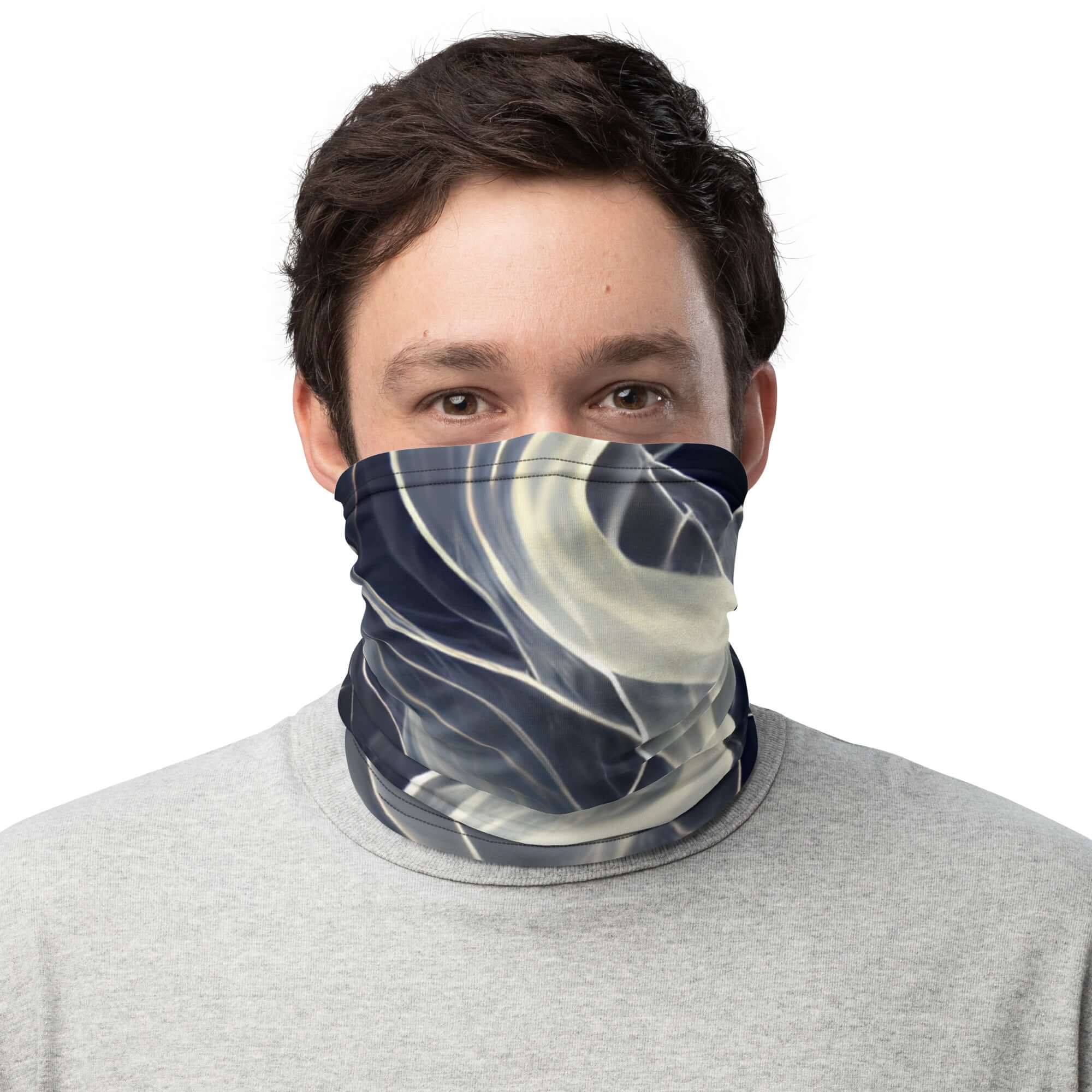 Person wearing a Smoke pattern gaiter as a face covering, showcasing comfort and style in outdoor activities.