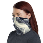 Woman wearing a Smoke pattern gaiter as a face covering and neck warmer, showcasing versatile style.