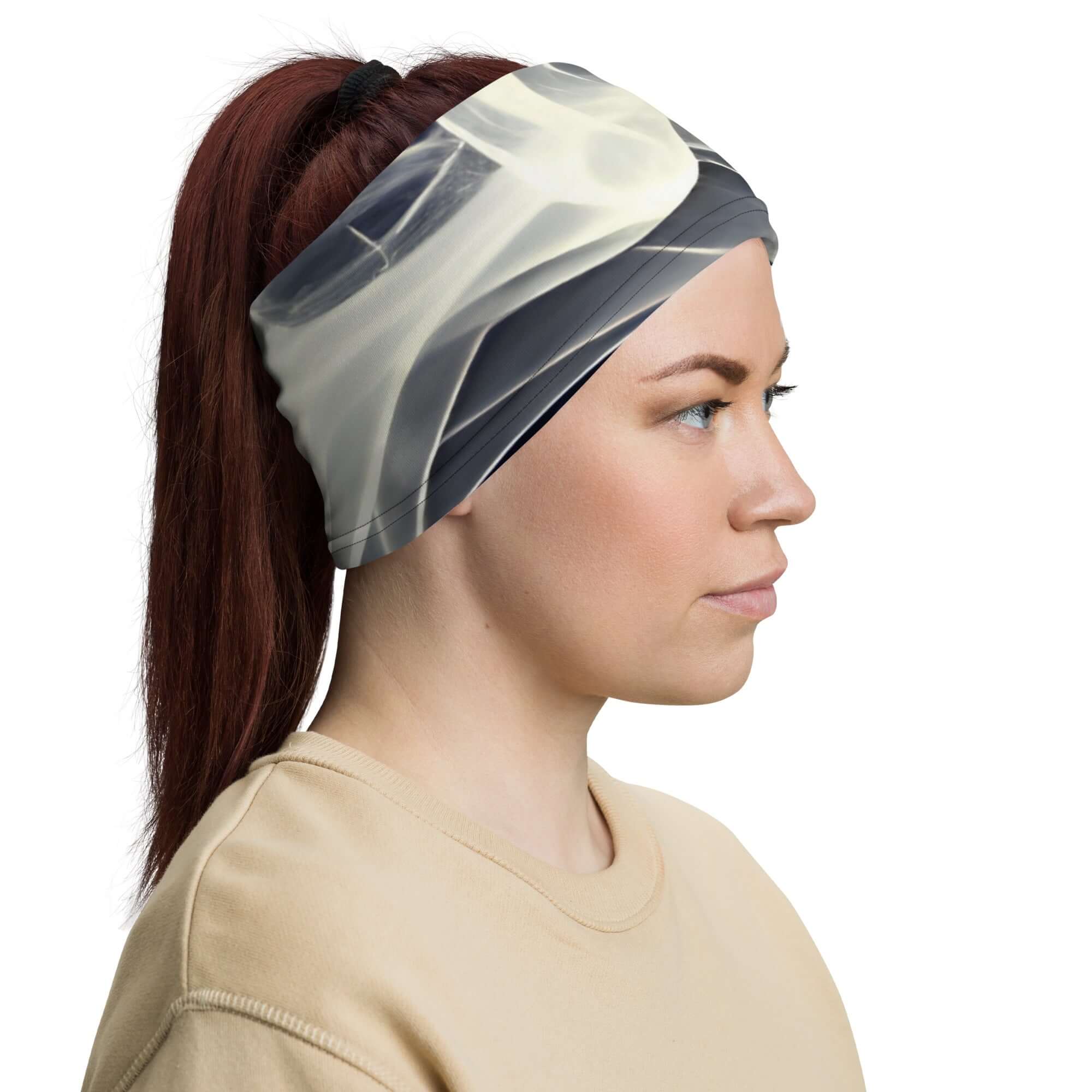 Woman wearing a Smoke pattern gaiter as a headband, showcasing comfort and style.