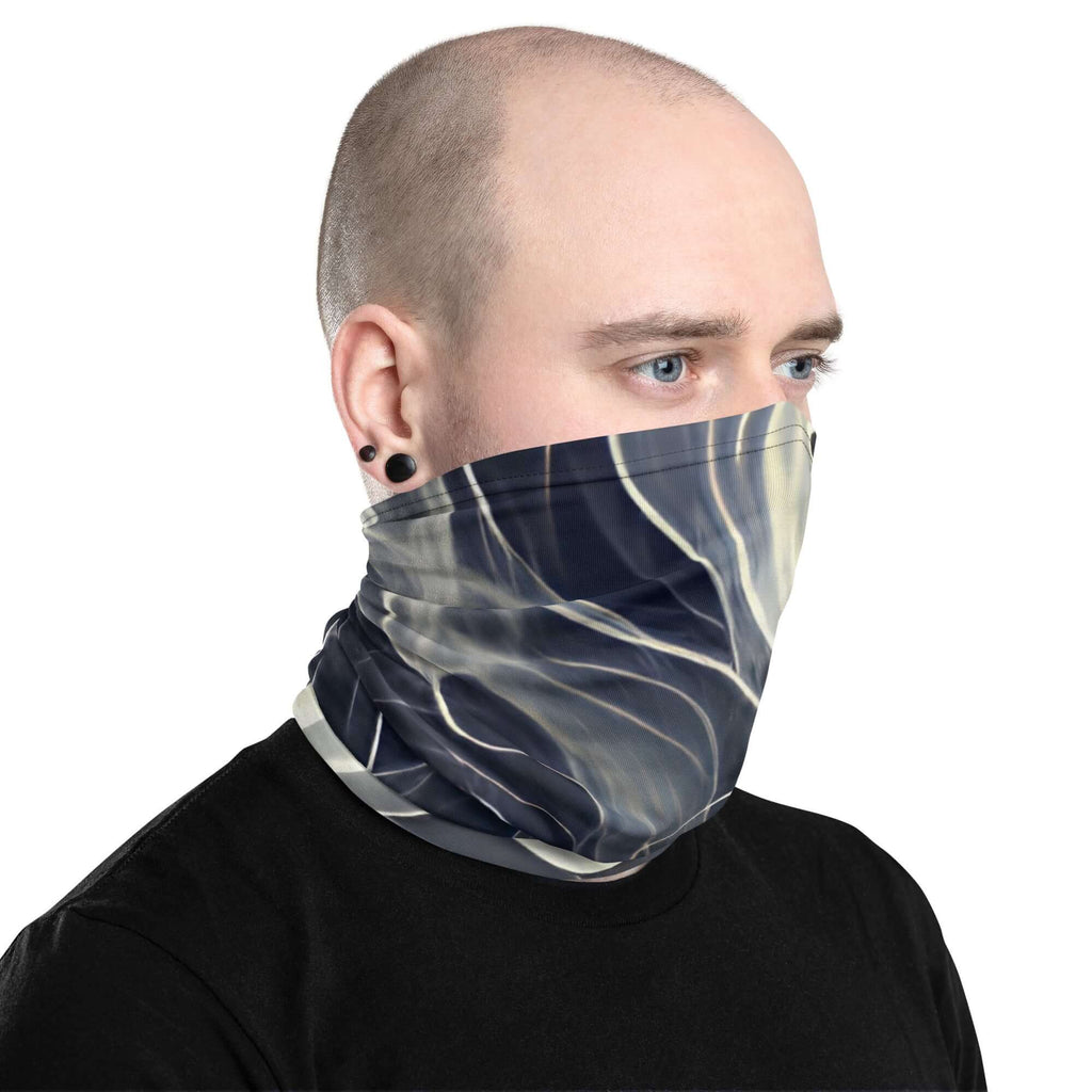 Man wearing a Smoke pattern gaiter, showcasing its versatility as a face covering and neck warmer.