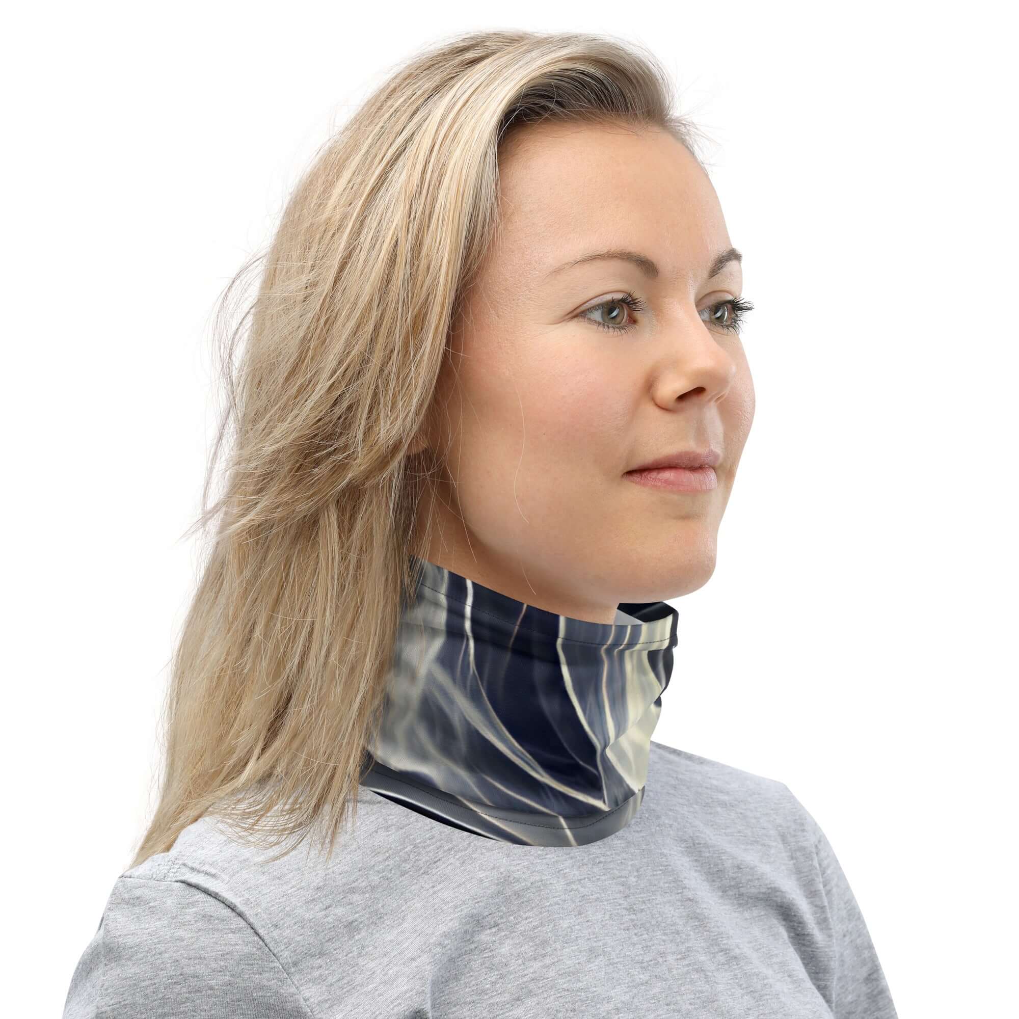 Model wearing a Smoke pattern gaiter, showcasing versatility as a neck warmer and face covering.