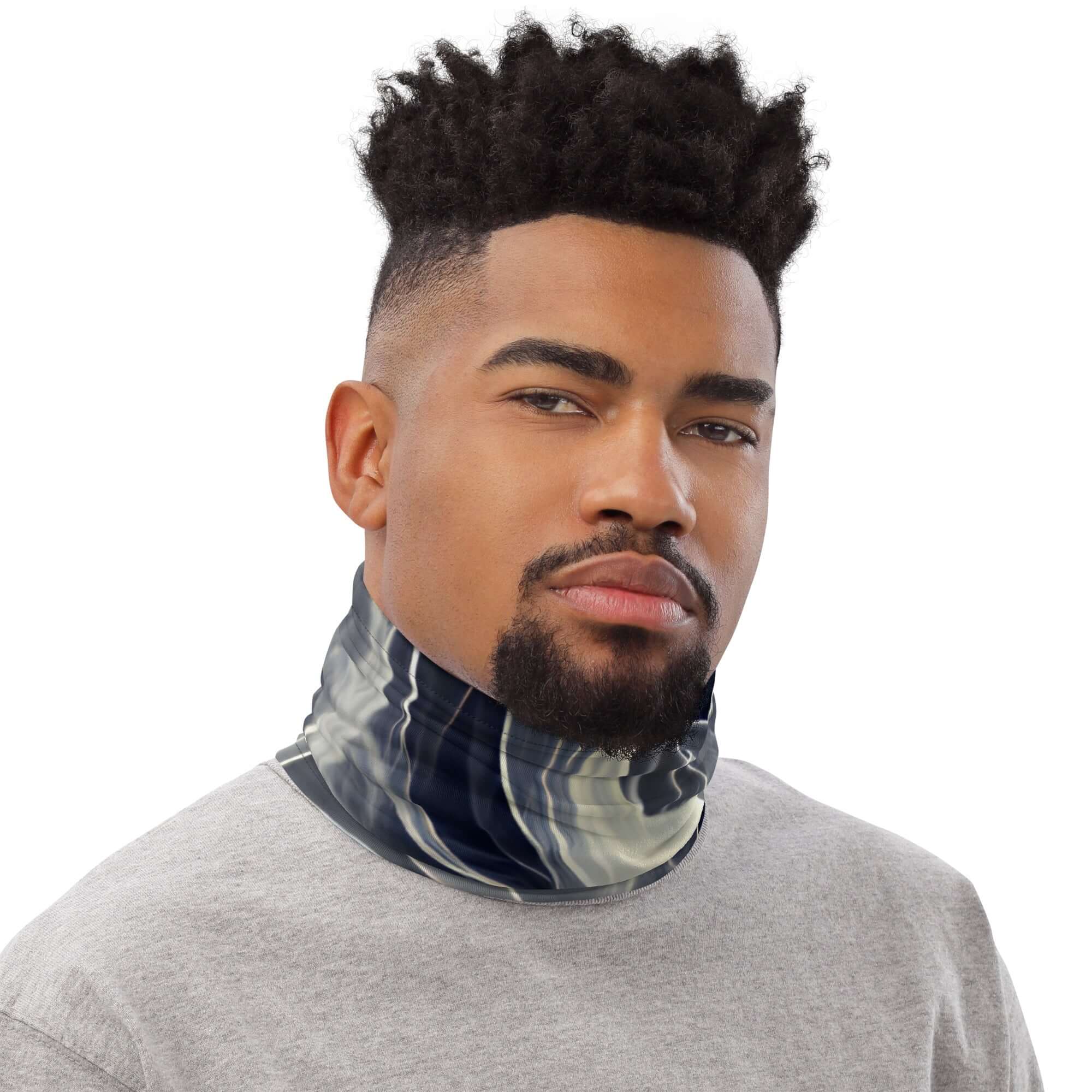 Man wearing a Smoke Pattern Gaiter as a neck warmer for comfort and style.