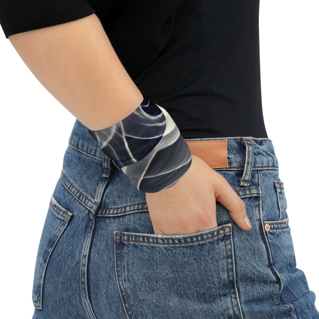 Smoke pattern gaiter worn as a stylish wristband accessory with a casual outfit.