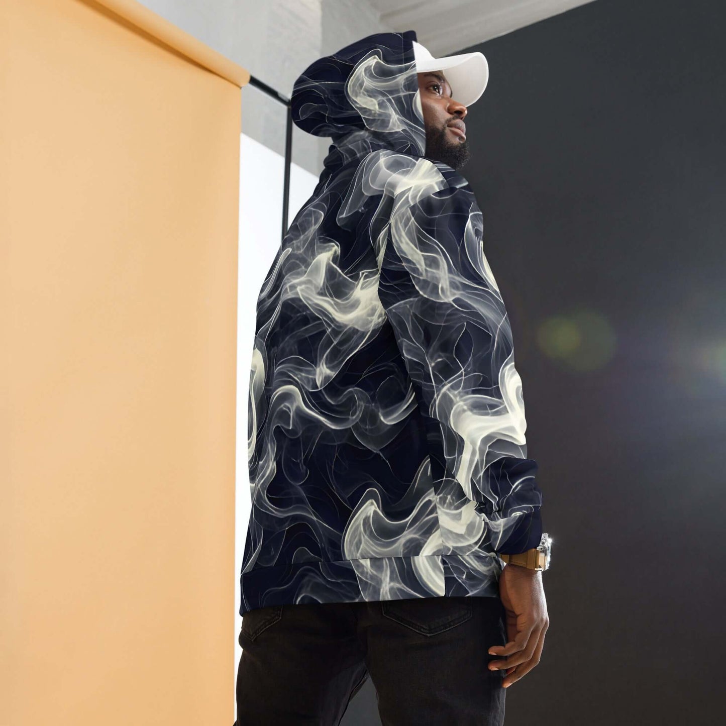 Man wearing Smokey Unisex Hoodie for Stylish Streetwear Enthusiasts with vibrant print in urban setting.