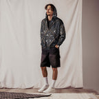 art deco filigree zip hoodie worn by a man with stylish shorts, showcasing intricate design and sustainable fashion.