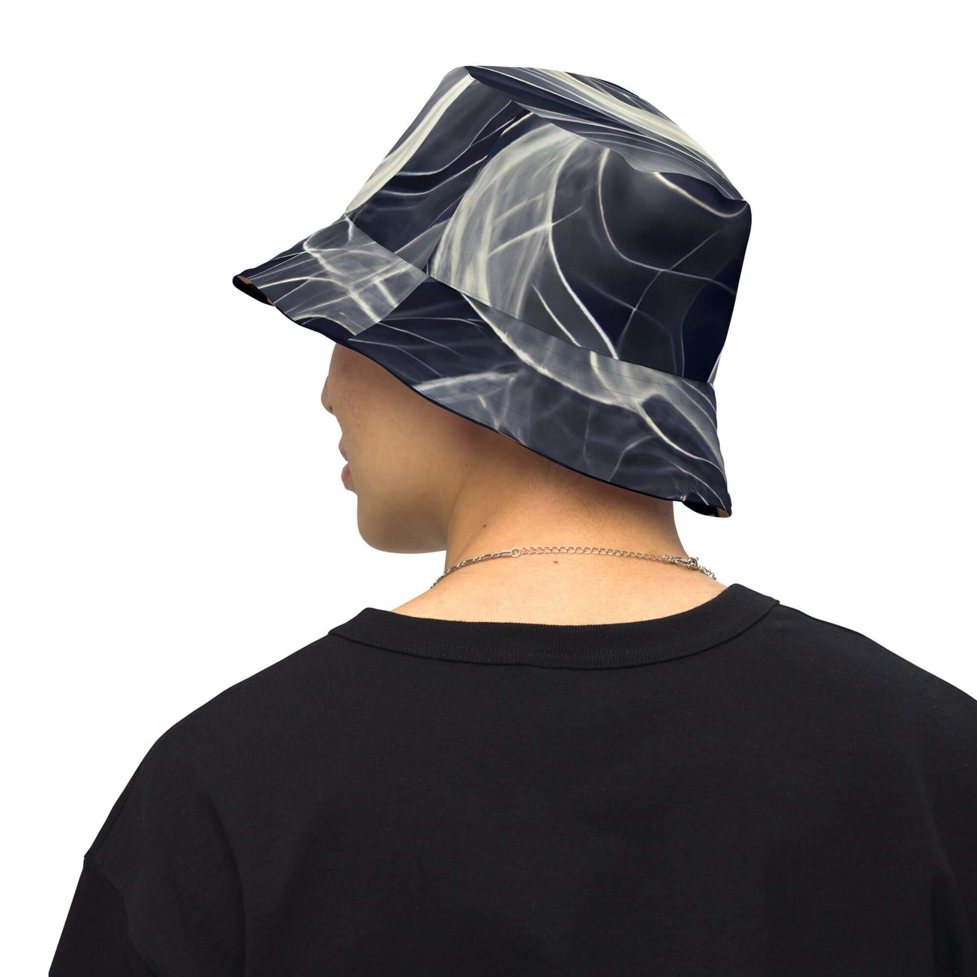 Reversible bucket hat streetwear showcased from the back, featuring a unique wave design and elevated style.