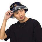 Young man wearing a reversible bucket hat streetwear, styled casually with a black t-shirt and jewelry.
