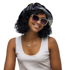 Smiling woman wearing a reversible bucket hat streetwear with sunglasses, showcasing versatile street style fashion.
