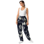 Smokey Wide-leg Joggers for Effortless Streetwear Style worn by a model, showcasing a stylish relaxed fit with swirly patterns.