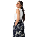 Smokey Wide-leg Joggers for Effortless Streetwear Style featuring a relaxed fit and side pockets, modeled by a smiling woman.