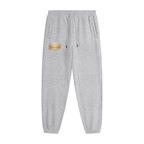 Goldfiore Unisex Heavyweight Fleece Joggers in gray with gold logo on the side.