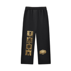 Cosimofiore Contrast-Stitched Fleece Sweatpants featuring gold graphic designs on a black background.