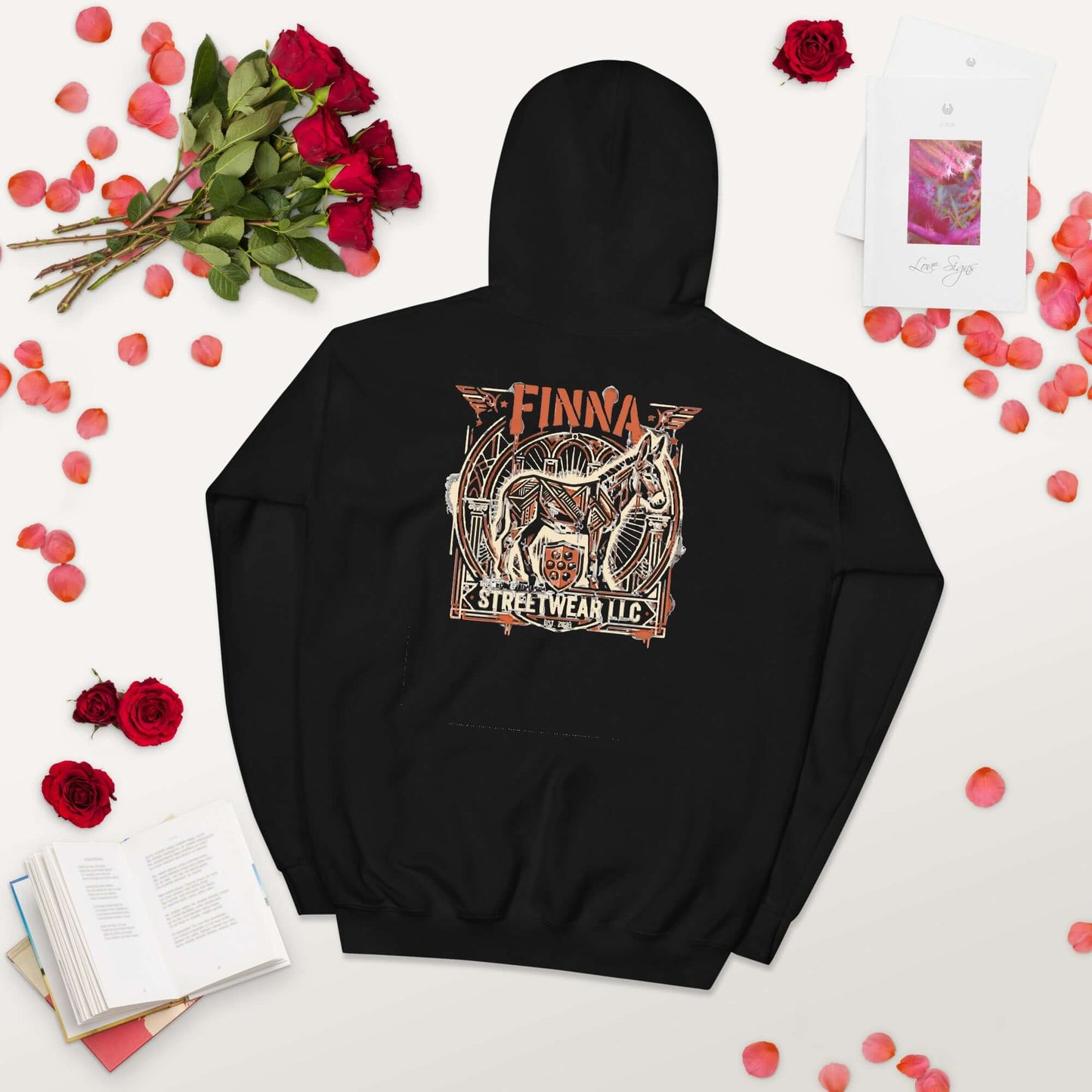 Lynxdonk Unisex Hoodie Cozy and Stylish Essential featuring a bold design on a black background with roses and accessories.