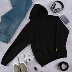 Lynxdonk Unisex Hoodie Cozy and Stylish Essential in black, styled with jeans and casual accessories.