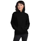 Lynxdonk Unisex Hoodie Cozy and Stylish Essential model wearing a black hoodie with a front pocket and a relaxed fit.