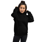 Lynxdonk Unisex Hoodie Cozy and Stylish Essential worn by model, black color, showcasing warmth and style.