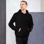 Lynxdonk Unisex Hoodie Cozy and Stylish Essential worn by a man, showcasing a sleek black design, perfect for stylish warmth.