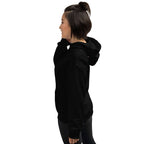 Lynxdonk Unisex Hoodie Cozy and Stylish Essential shown on a model from the side in black color.