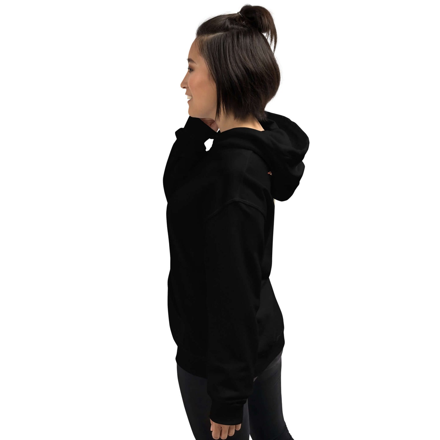 Lynxdonk Unisex Hoodie Cozy and Stylish Essential shown on a model from the side in black color.