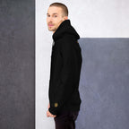 Lynxdonk Unisex Hoodie Cozy and Stylish Essential worn by a model, showcasing its comfort and sleek design in black.