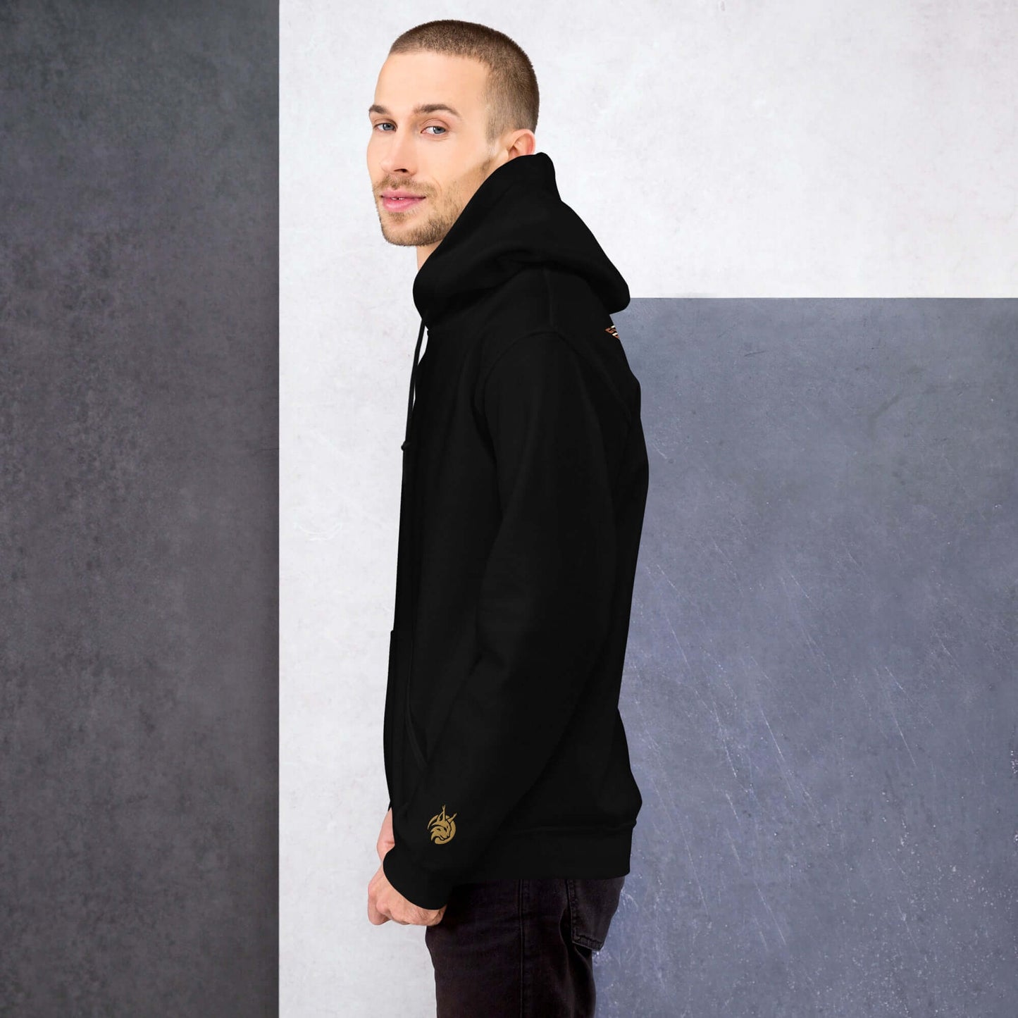 Lynxdonk Unisex Hoodie Cozy and Stylish Essential worn by a model, showcasing its comfort and sleek design in black.