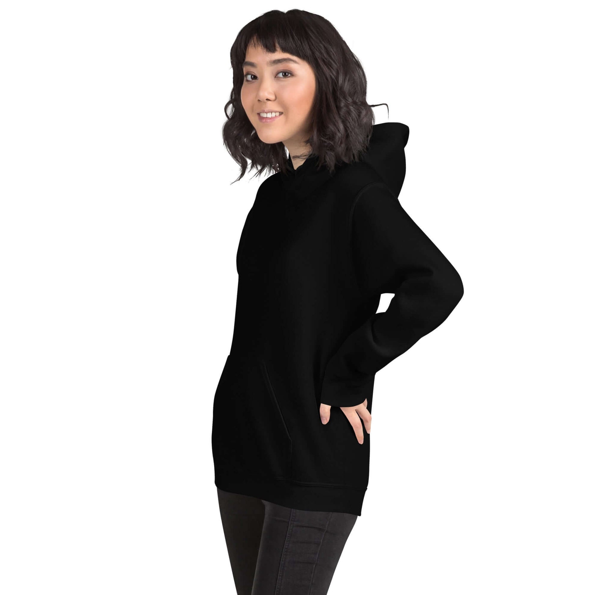 Lynxdonk Unisex Hoodie Cozy and Stylish Essential worn by a smiling girl in black, showcasing a stylish and comfortable fit.