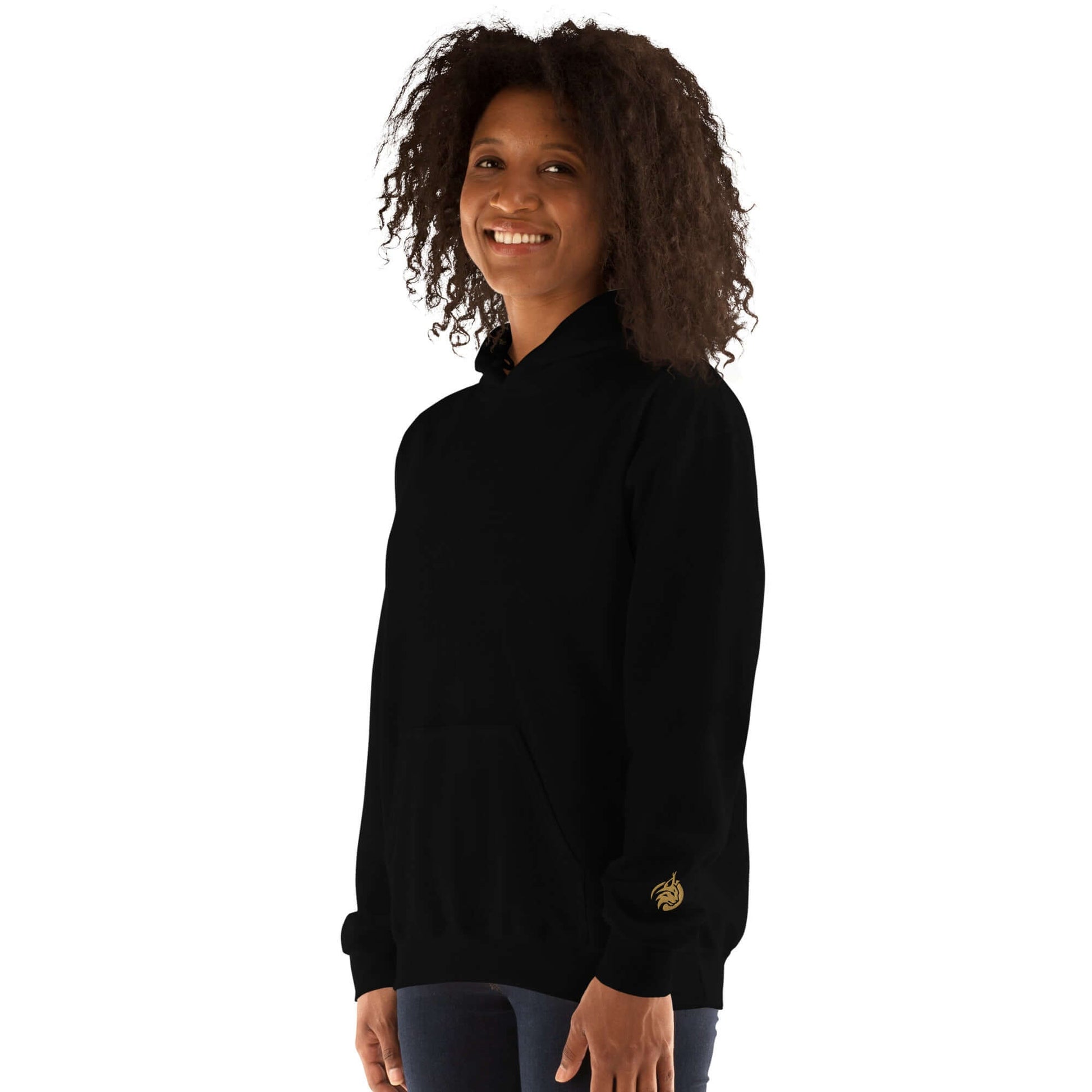 Lynxdonk Unisex Hoodie Cozy and Stylish Essential worn by a smiling woman with curly hair.
