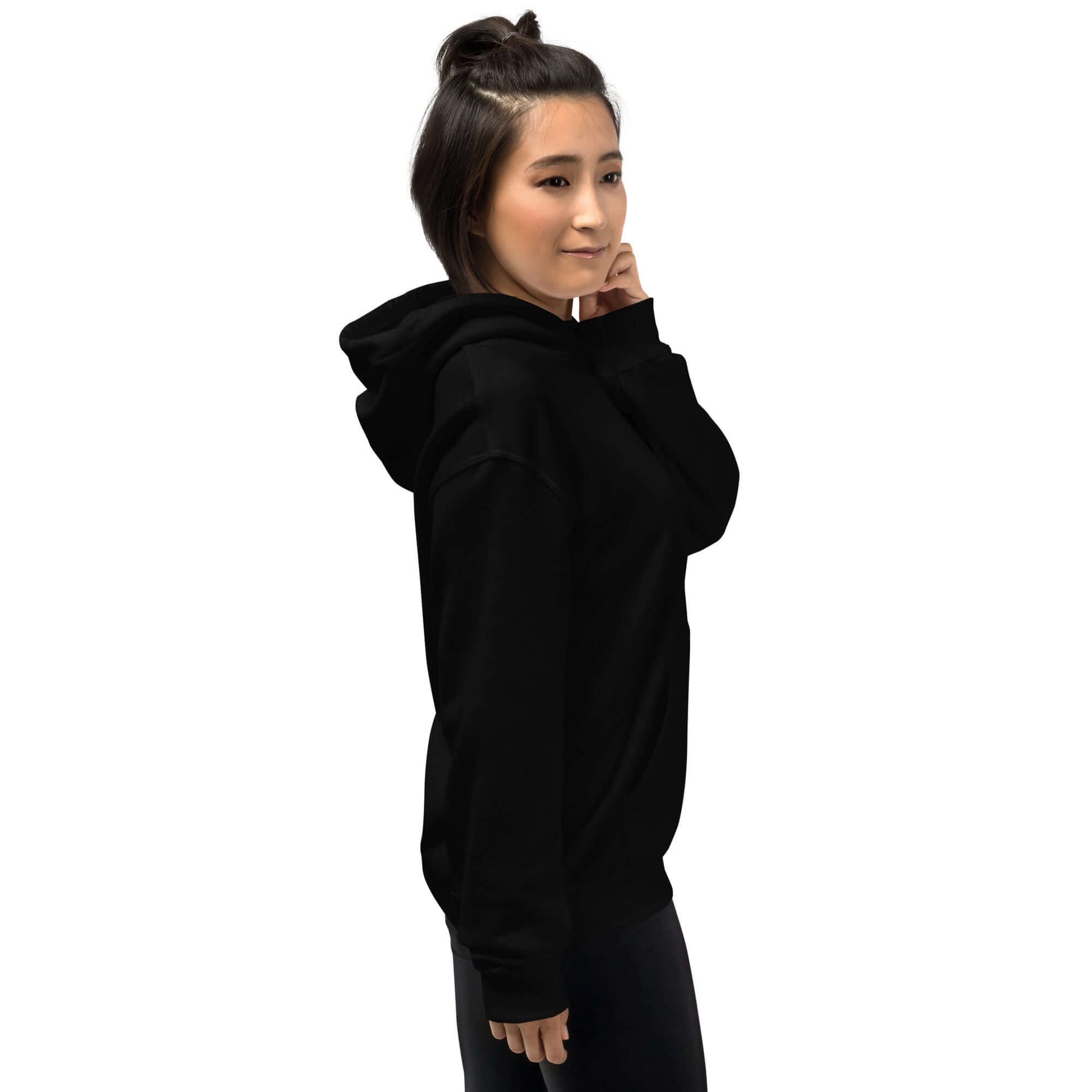 Lynxdonk Unisex Hoodie Cozy and Stylish Essential worn by a model in black, showcasing its comfort and style.