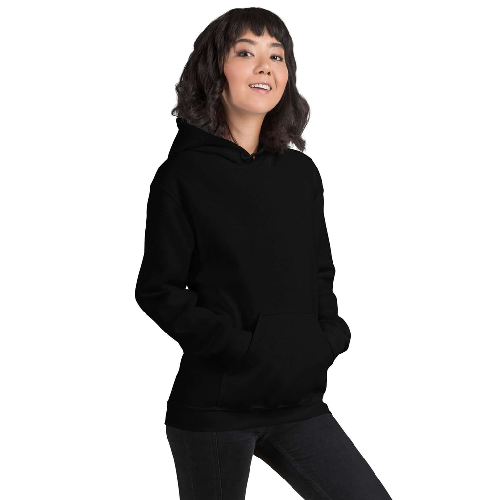 Lynxdonk Unisex Hoodie Cozy and Stylish Essential worn by a model with a cheerful expression, ideal for cozy evenings.