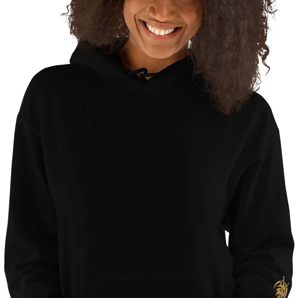 Lynxdonk Unisex Hoodie Cozy and Stylish Essential worn by a smiling woman in a black hoodie with a stylish design.