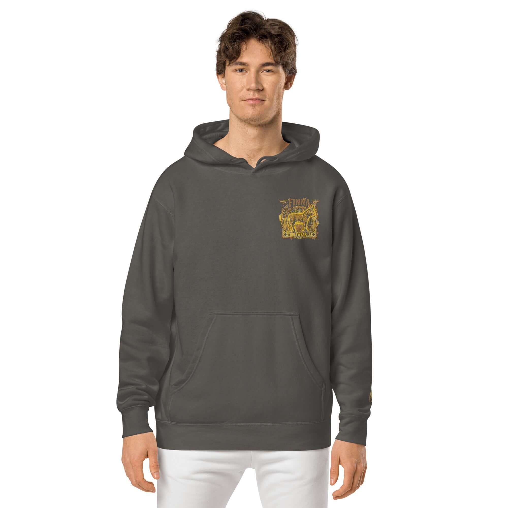 LynxDonkey Unisex pigment-dyed hoodie worn by a man, showcasing its unique vintage design and comfort.