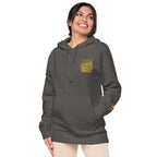LynxDonkey Unisex pigment-dyed hoodie modeled by a smiling woman in a stylish design.