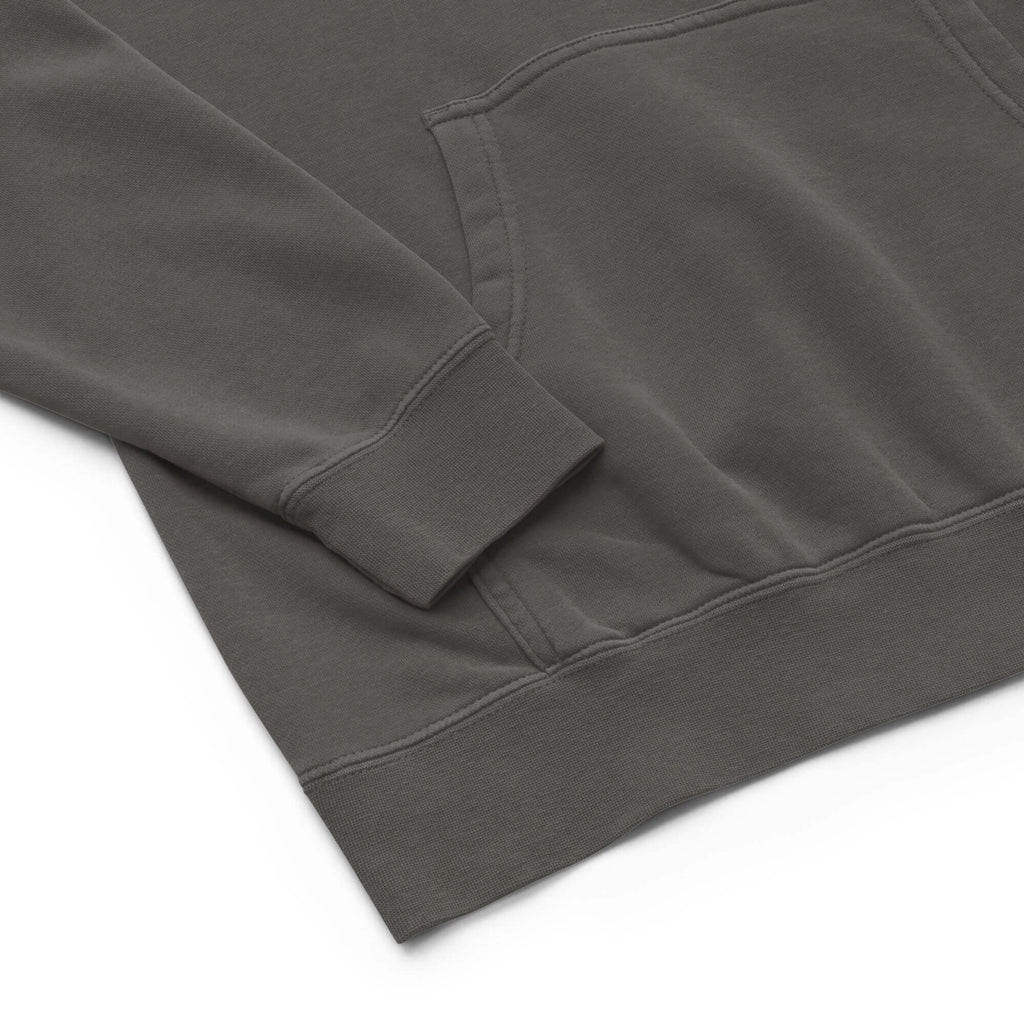 LynxDonkey Unisex pigment-dyed hoodie showcasing the soft fabric and pocket detail in a unique gray shade.